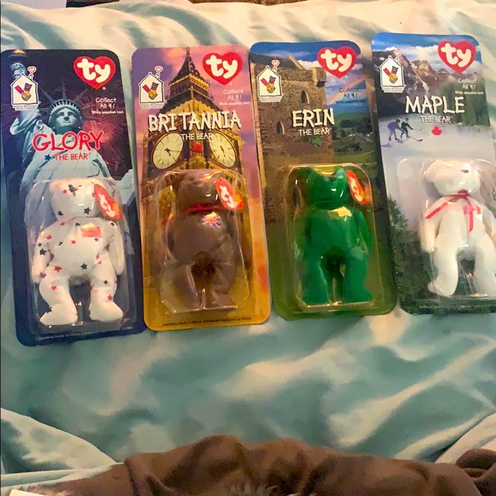 New! never opened full set of 4 TY beanie babies